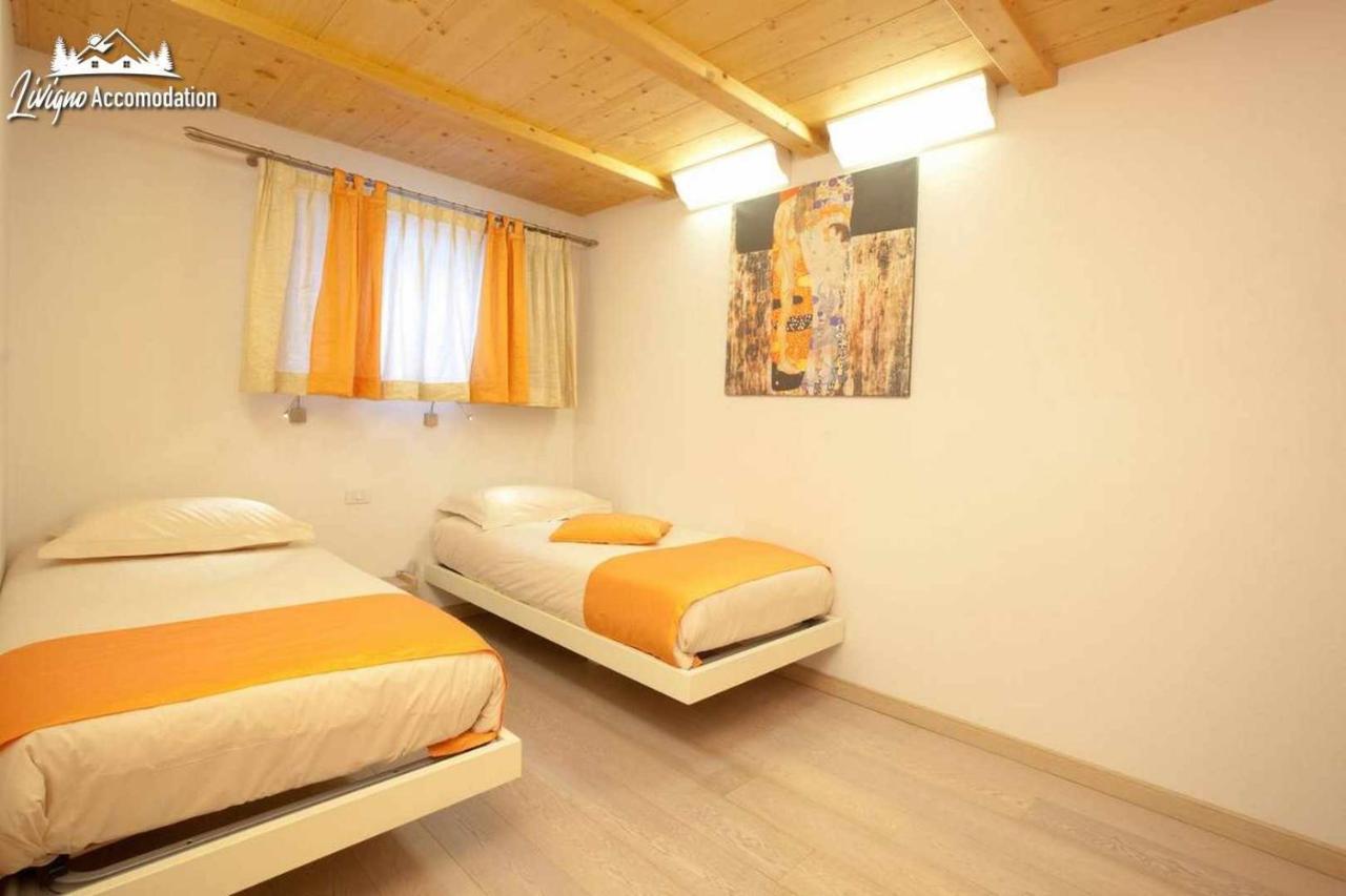 Appartamenti Green By Livigno Accomodation ภายนอก รูปภาพ